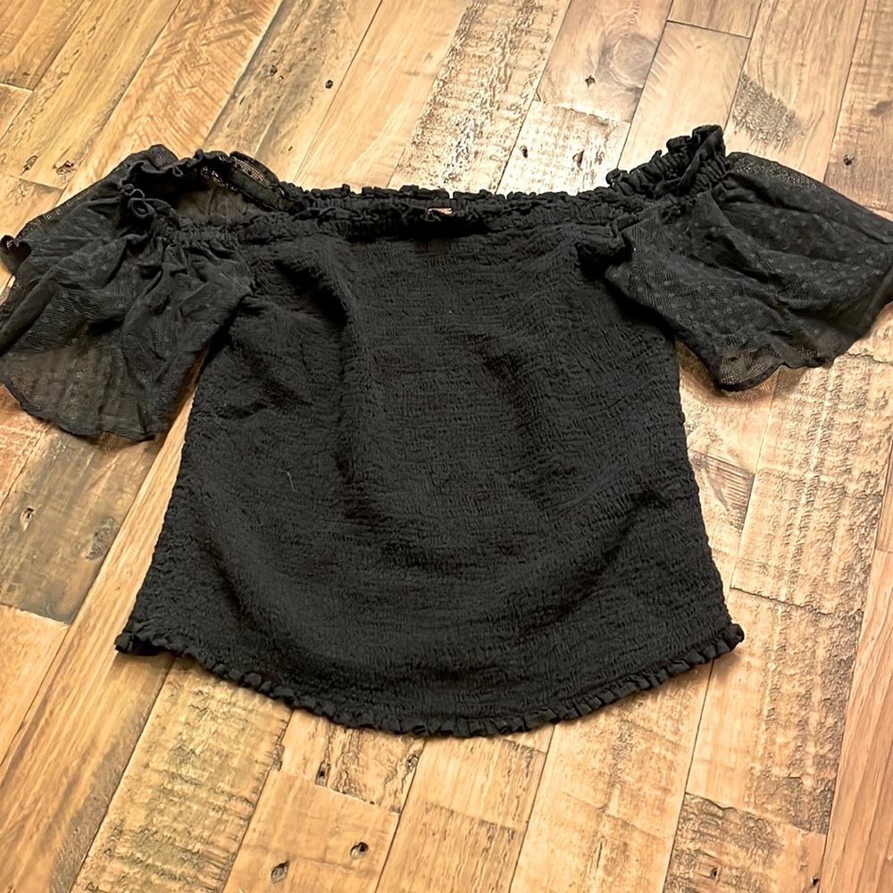 FREE PEOPLE off the shoulder black top with ruffle sleeves